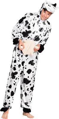 A person wearing a cow costume with udders.