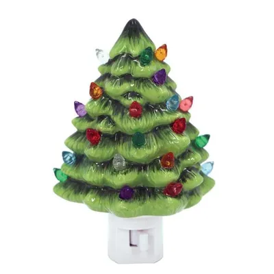 A ceramic Christmas tree night light with colorful bulbs.