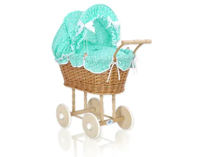 Produktbild von Puppenwagen MY SWEET BABY mit mintgrüner Bettwäsche im natürlichen Korb und Holzuntergrund