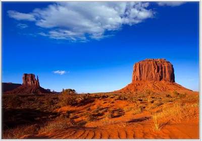 Produktbild von Wallario Wandbild Monument Valley am Abend I, Größe: 70,30 x 100,30 cm, Poster mit weißem Kunststoffrahmen