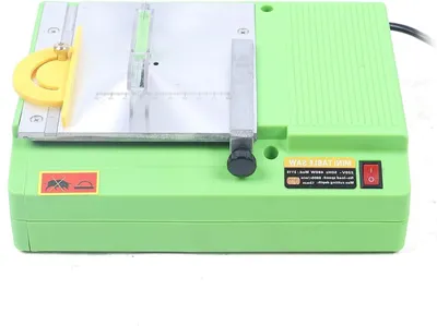 Immagine prodotto di Troncatrice da banco - Mini sega - Lavorazione del legno - Motore potente - Profondità di taglio: 10 mm - Colore: verde