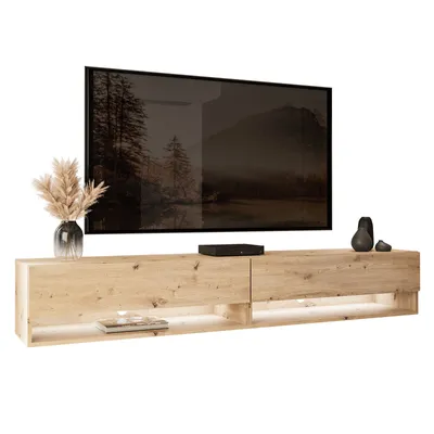 A modern, wall-mounted TV cabinet with a television mounted above it, set against a white background.