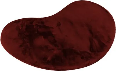 A single, kidney-shaped rug is shown against a white background.
