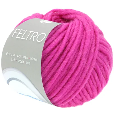 A ball of pink yarn with a label.