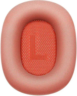 A close-up, top-down view of a red ear cushion for Apple AirPods Max headphones.