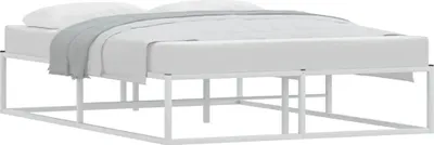 A white metal bed frame with a mattress and a grey blanket.