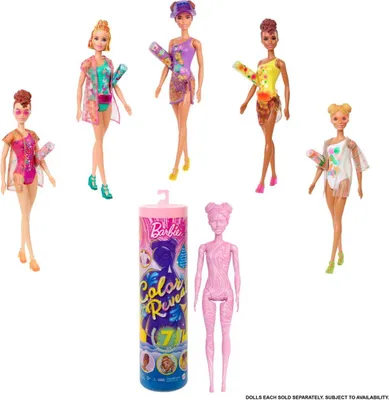 A collection of Barbie dolls and their packaging.
