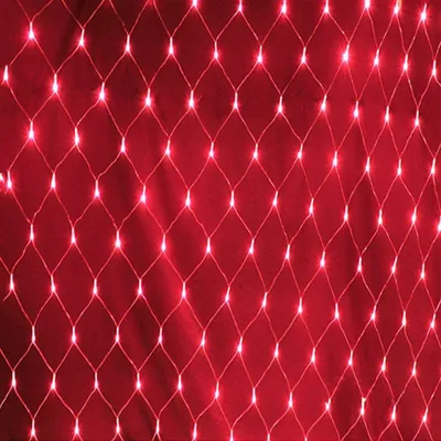A close-up of a red net light curtain with many small white lights.