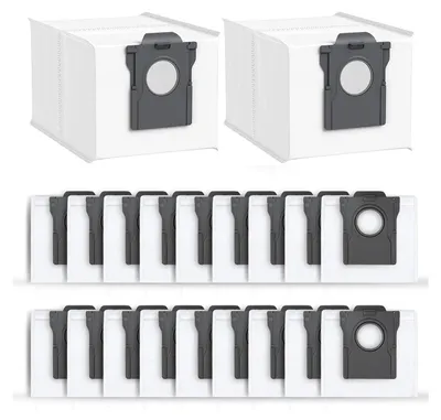 A product shot of multiple vacuum cleaner dust bags arranged in rows against a white background.