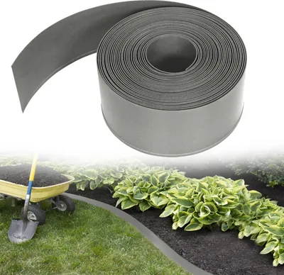 A roll of grey plastic garden edging is shown in the upper part of the image, with a garden scene in the lower part, featuring a wheelbarrow with soil and a shovel, and a flower bed with green plants bordered by the edging.