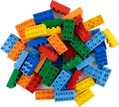 A pile of colorful building blocks on a white background.