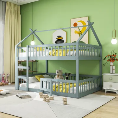 A children's bunk bed set up in a bedroom with toys and decor.