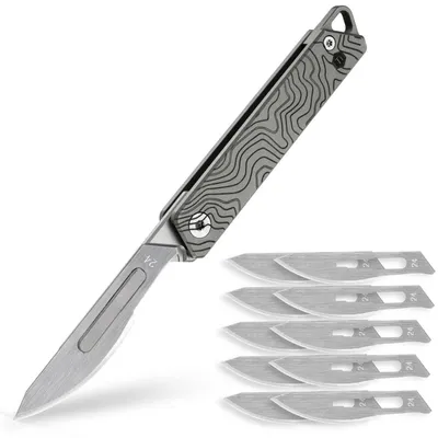 Immagine prodotto di Coltello tascabile Titan Flipper con lama #24, motivo "nuvole" Suminagashi, impugnatura in Ti-6Al-4v, acciaio 2Cr13Mov, cuscinetti in Vetroceramica, sistema di apertura rapida, compatto e leggero (1 oz)