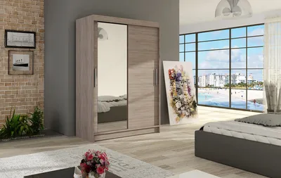 A bedroom scene with a wardrobe, bed, and artwork.