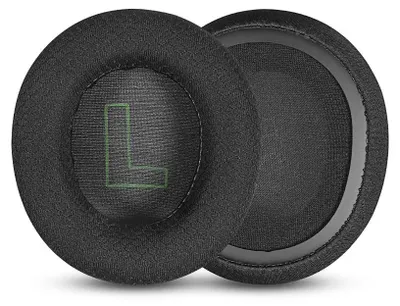 Two black ear pads for headphones, one with a green 'L' logo.