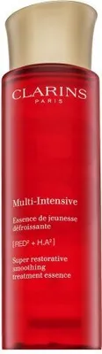 A product shot of a red bottle of Clarins essence with a gold cap.