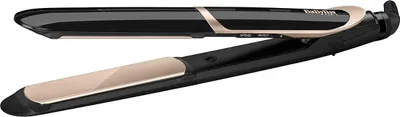 A black and gold hair straightener is shown against a white background.