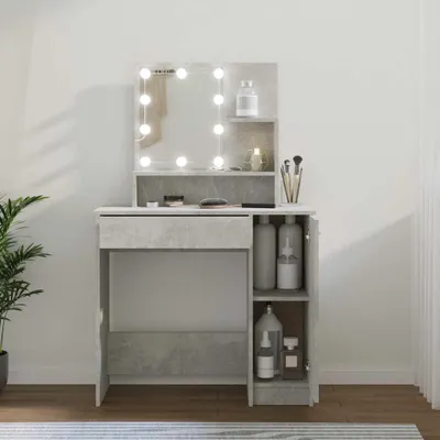 A makeup vanity with a lighted mirror and storage shelves.