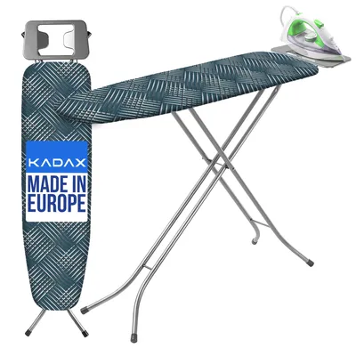 A KADAX ironing board with an iron resting on its heat-resistant tray, set against a white background.