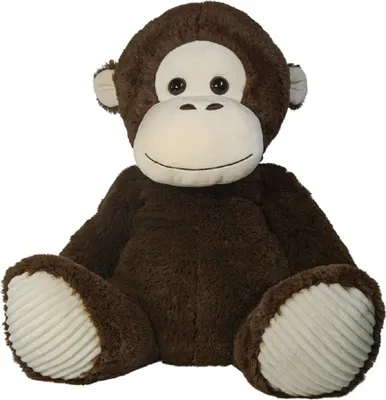 A plush monkey toy is sitting on a white background.