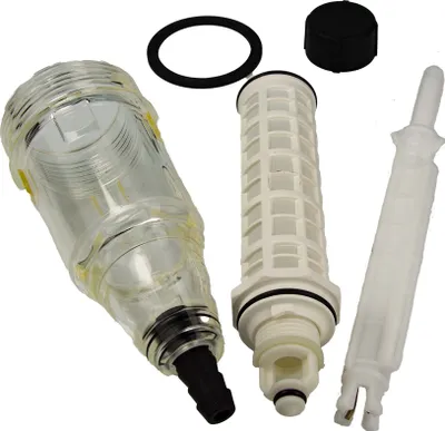 A set of water filter components, including a clear plastic housing, a white filter element, a black O-ring, and a white plastic rod, laid out against a white background.