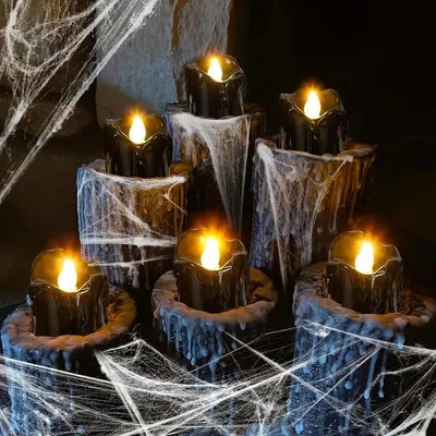 Immagine prodotto di 12 candele a LED per Halloween, senza fiamma, nere, ideali per decorazioni a tema Halloween