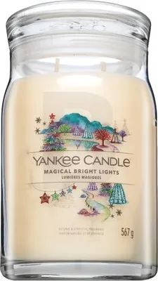 A Yankee Candle in a glass jar with a lid, featuring a festive winter scene on the label.