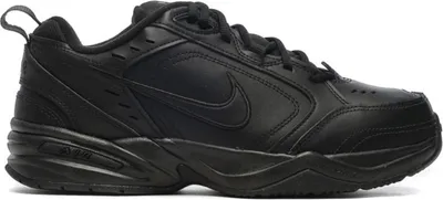 A studio shot of a black Nike Air Monarch IV sneaker.