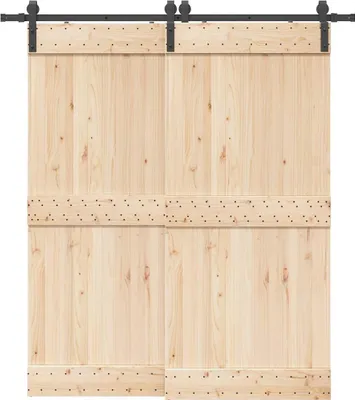 A pair of unfinished wood sliding barn doors with black metal hardware.