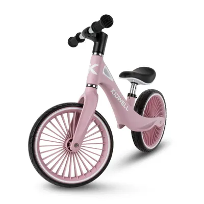 A pink balance bike for children is shown against a white background.