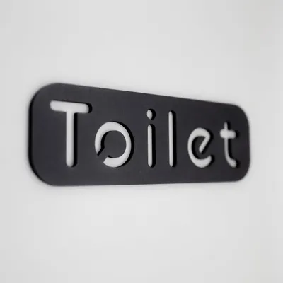 Toilettenschild selbstklebend, Unisex, schwarz, 15 x 5 cm, „Toilet“