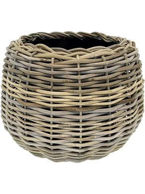 A close-up, front-facing view of a woven rattan planter.