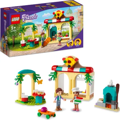 A LEGO Friends Heartlake City Pizzeria Restaurant playset is shown, both in its packaging and assembled.