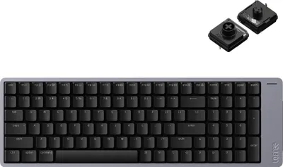 A keyboard and two keycaps are shown against a white background.