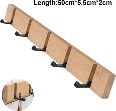 A wooden wall-mounted coat rack with five black hooks, presented against a white background. A small inset image shows a close-up of the rack and hooks, with items hanging from them.