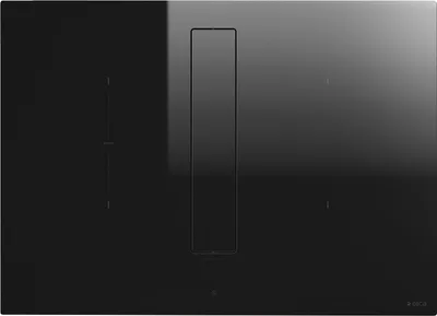 A black induction cooktop with an integrated ventilation system.