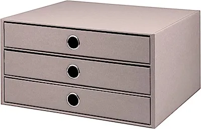 A taupe colored three-drawer storage box is shown from a front-facing angle against a white background.