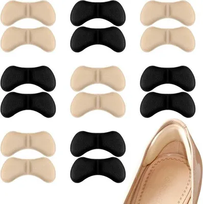 Produktbild von Zwei Paar - Selbstklebende Hielkussenten - Hielkussenten für lose Schuhe - Antislip-Schuhekissen - Fußschutz - Schutz vor Blasen - Schuhsohlenbeschutzung - Schwarz und Beige - 4*9 cm