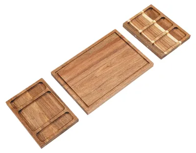 Three wooden cutting boards arranged diagonally on a white background.