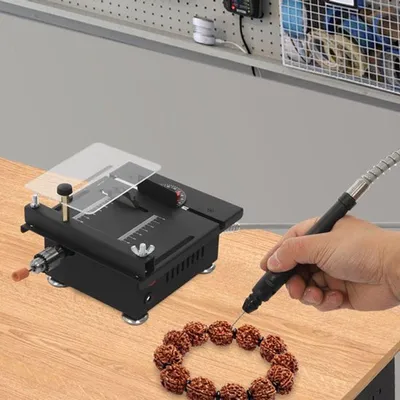 Produktbild von Mini-Tischkreissäge – 100 Watt, kompakte Bauweise, 7 Geschwindigkeitsstufen und kaltgewalzter Stahl, ideal für den Heimgebrauch