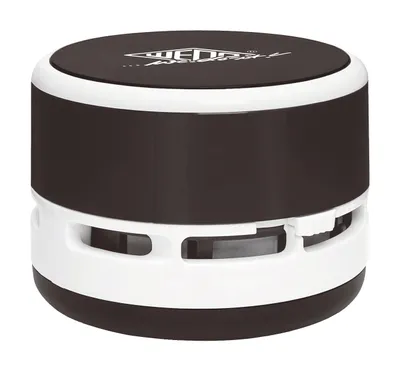 A product shot of a mini desktop vacuum cleaner.