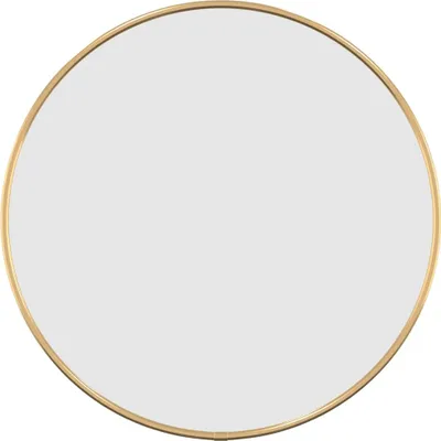 A round mirror with a gold frame.
