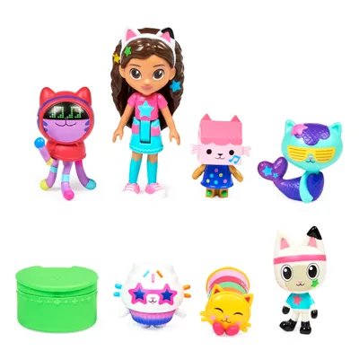 A collection of toy action figures, primarily cat-themed, arranged on a white background.