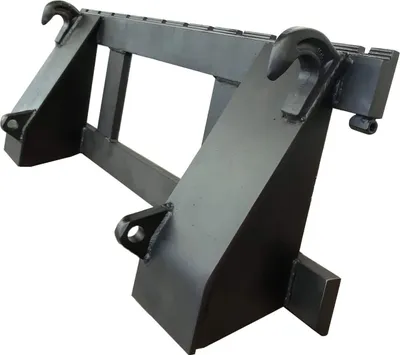 A heavy-duty metal attachment for a tractor or loader, designed to hold forks or other attachments.