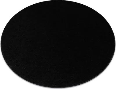 A black circular rug is shown from a top-down perspective on a white background.