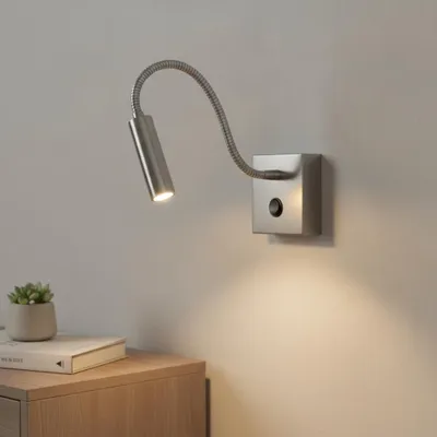 Zdjęcie produktu dla Ścienna lampka do czytania LED Madison, wariant: 3 W LED, chrom, productTiles.product.images.aiGenerated