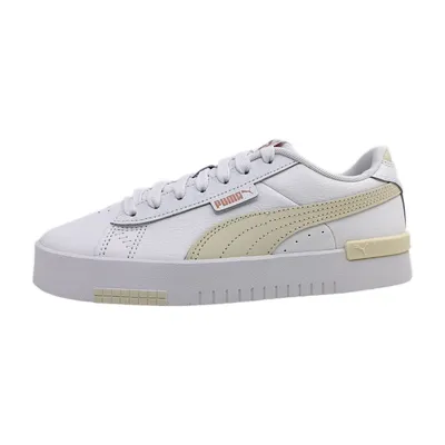 A white Puma Jada Renew sneaker with beige accents is shown against a white background.