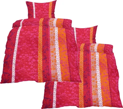 A set of bedding with a striped and floral pattern.