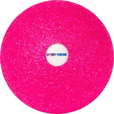 A pink massage ball with a white logo in the center.