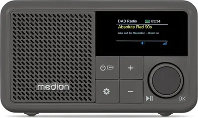 A studio shot of a gray Medion DAB+ radio with a screen displaying radio information and buttons for control.